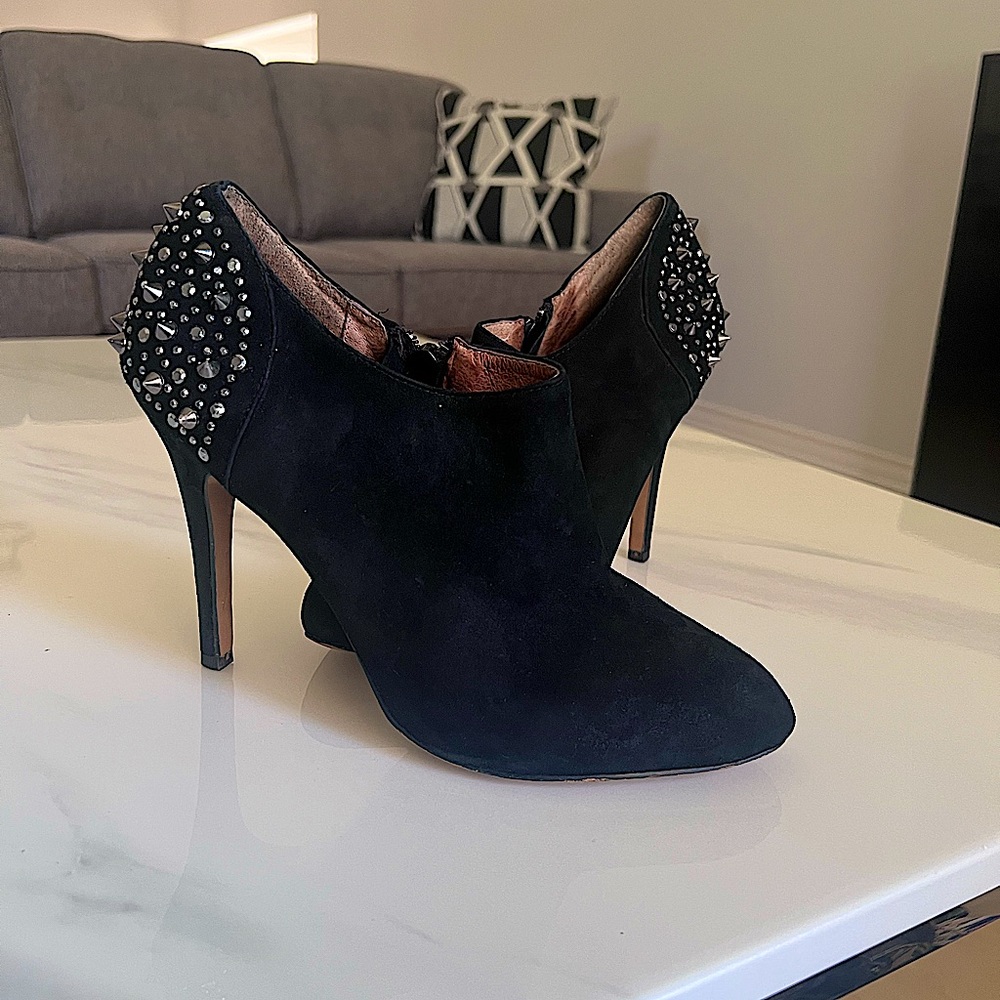 Aldo booties with rhinestone and spike heel detail. Size 9.